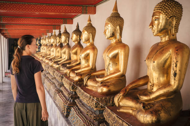 istock Tourist visiting at Wat Pho buddhist temple in Bangkok 649680002