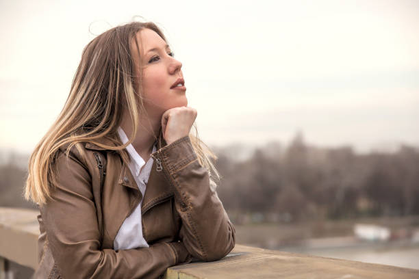 istock Girl on the bridge 649687972