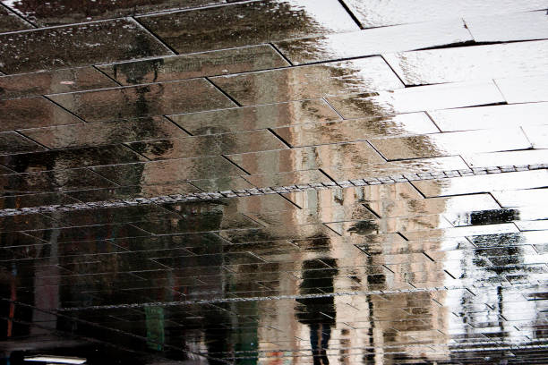 istock Reflections in the rainy street 649688350