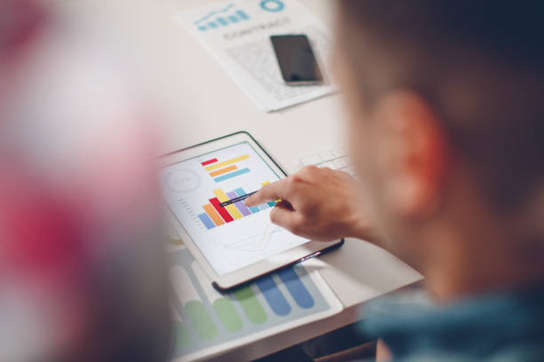 istock Businessmeeting about new technology 649688402