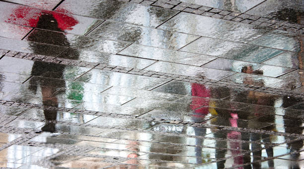 istock Reflections in the rainy street 649688406