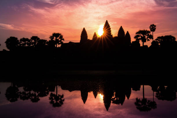 istock Angkor Wat temple at dramatic sunrise sunburst 649688472
