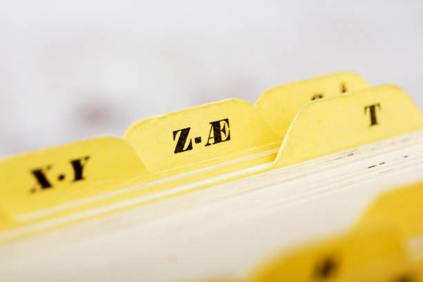 istock Close up of alphabetical index cards in box 649689002
