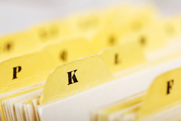 istock Close up of alphabetical index cards in box 649689024