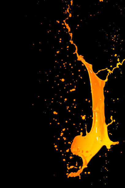 istock isolated orange water splash on background 649689126