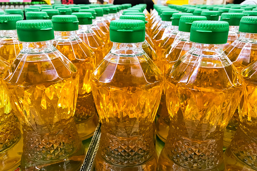 Closed up pile of bottled palm oil