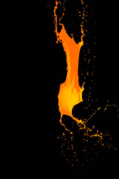 istock isolated orange water splash on background 649695894