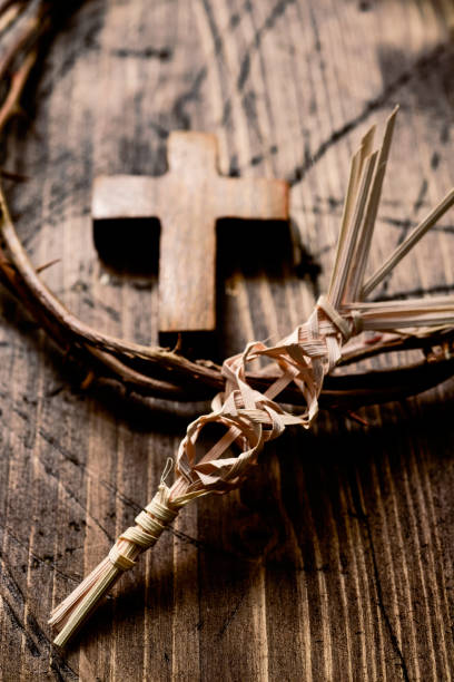 istock braided palm, cross and crown of thorns 649699360