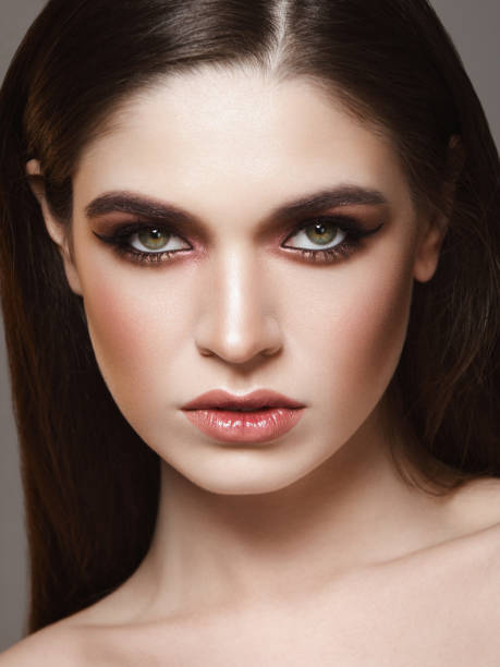 istock Beautiful and confident woman with cat-eye make-up 649708204