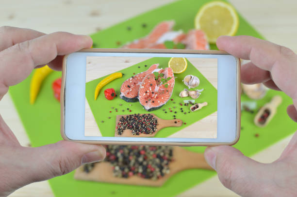 istock Fresh Salmon on Cell Phone 649711738