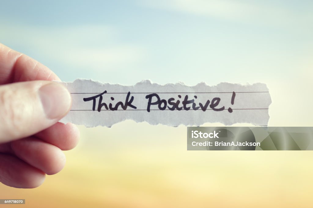 Think positive Think positive message concept for optimistic thinking and self belief Positive Emotion Stock Photo