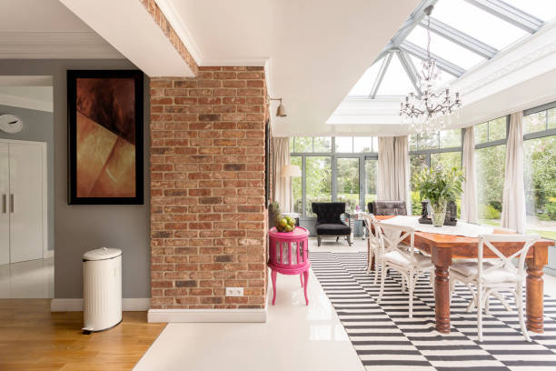 istock Dining area with glass roof and walls 649718406