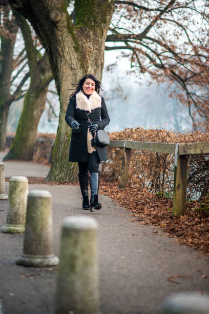 istock Beautiful woman in town 649718948