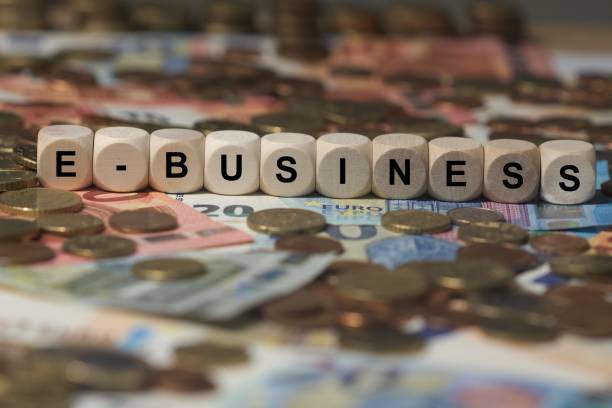 istock e-business - cube with letters, money sector terms - sign with wooden cubes 649727240