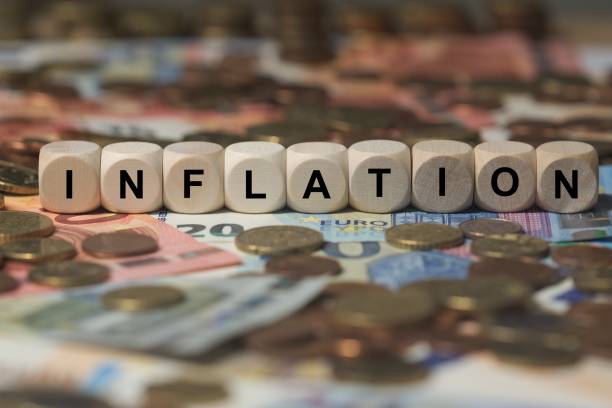 istock inflation - cube with letters, money sector terms - sign with wooden cubes 649727442