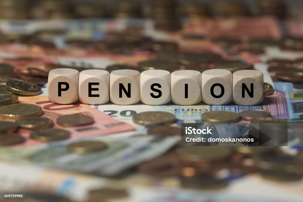 pension - cube with letters, money sector terms - sign with wooden cubes cubes with letters - sign with wooden cubes - money sector terms Retirement Stock Photo