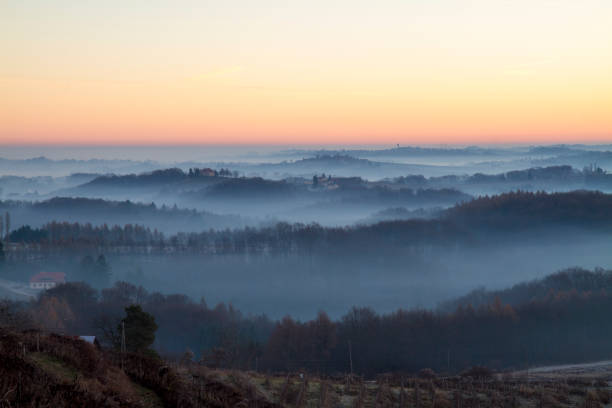 istock Mountains covered in fog during sunset 649734142