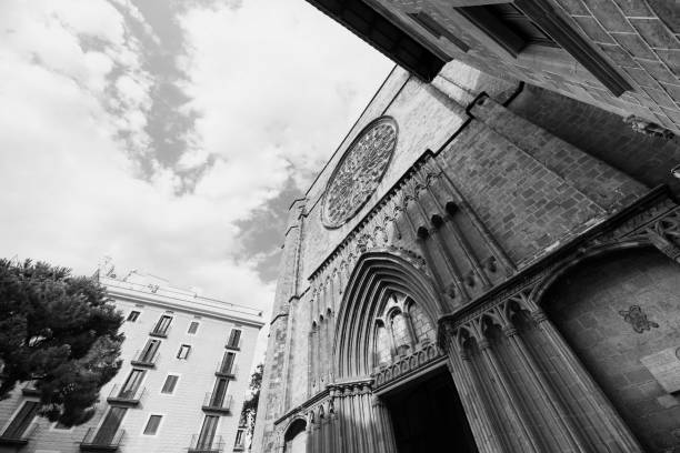 Barcelona, Spain - July 11, 2016:  Barcelona (Catalunya, Spain): facade of Santa Maria del Pi, gothic church. Black and white