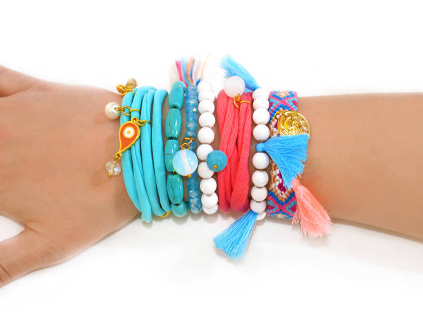 istock womans hand wearing bohemian gypsy bracelets 649742842