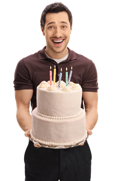 istock Joyful man with a birthday cake 649746614