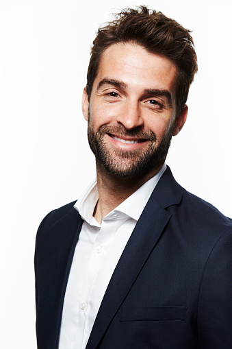 Smart smiling man in suit, portrait
