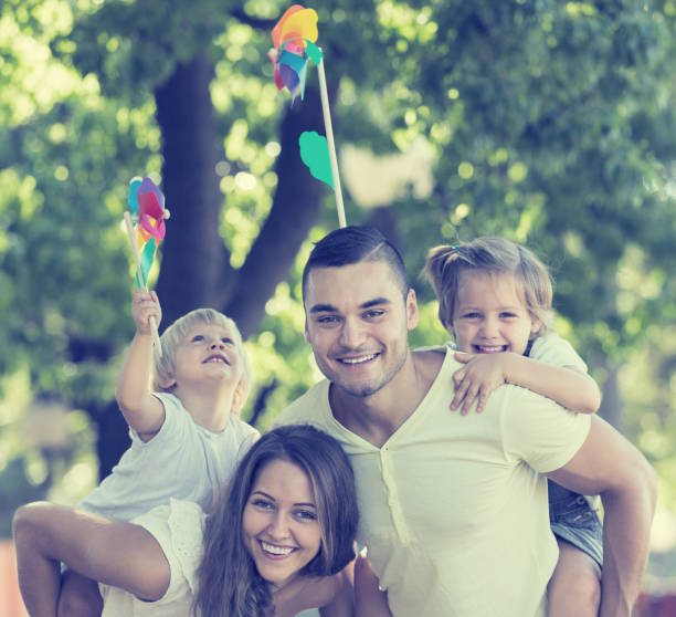 istock Parents walking with children 649751590