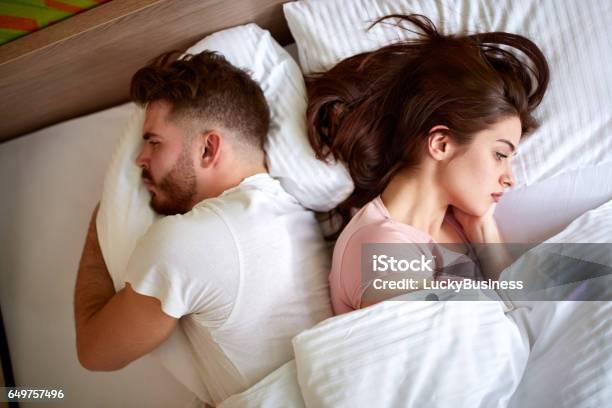 Problems In Relationship Stock Photo - Download Image Now - Couple - Relationship, Bed - Furniture, Sadness