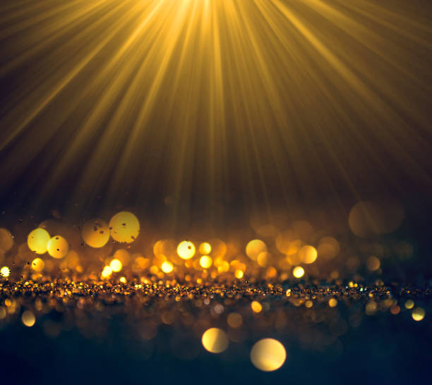 istock Beautiful rays of light with glitter lights grunge background, glitter defocused abstract Twinkly Lights and Stars Christmas Background. 649761430