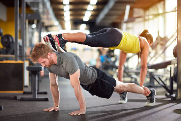 istock Trained couple in gym 649762280