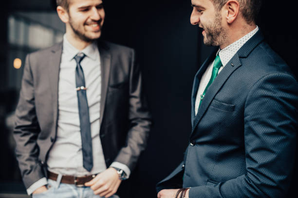 istock Two business persons wearing suits 649769004