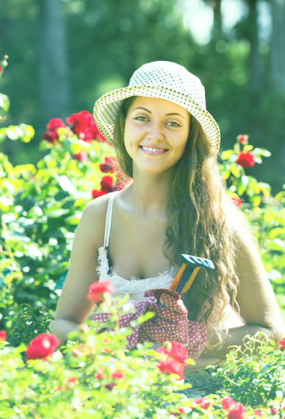 istock Female florist in summer garden 649769028