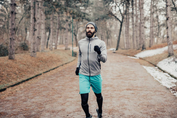 istock Athlete went for a jog in the park 649782164