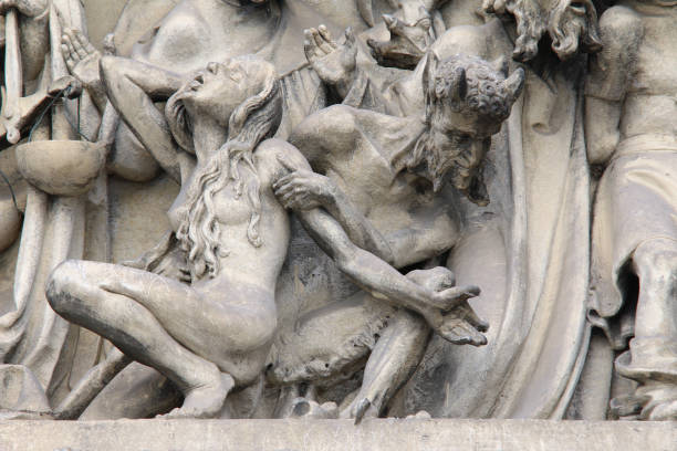 istock Fall into Hell - detail of the sculpture of the Last Judgment 649787128
