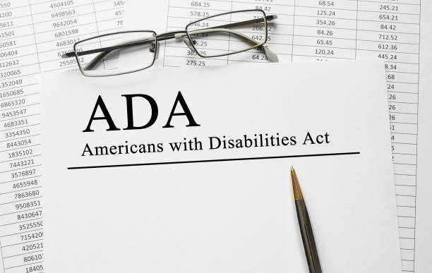 Paper with Americans with Disabilities Act ADA on a table Paper with Americans with Disabilities Act ADA on a table acting performance stock pictures, royalty-free photos & images