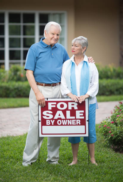 istock Sad senior couple selling house 649791946