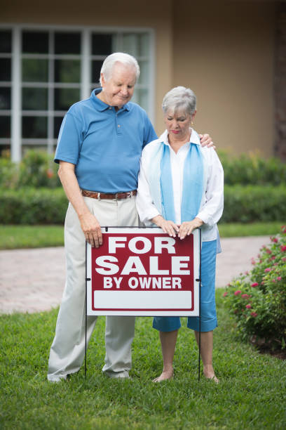 istock Sad senior couple selling house 649792066