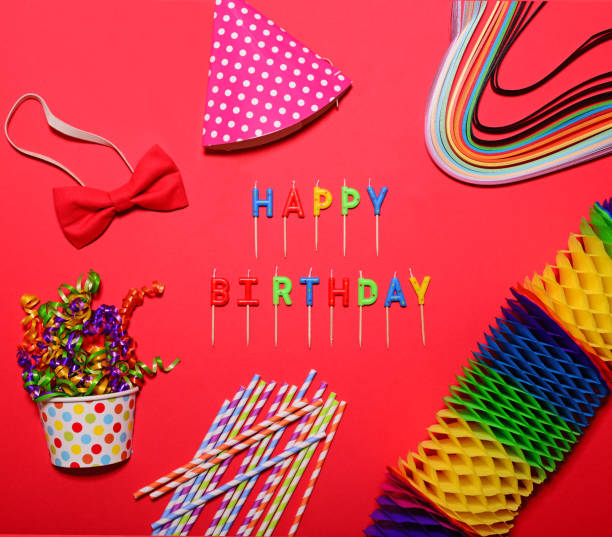 istock Happy Birthday flat lay party decorations on red background 649792614