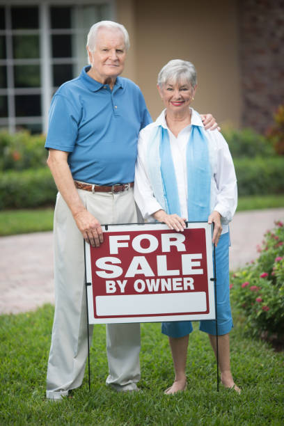 istock Sad senior couple selling house 649794764