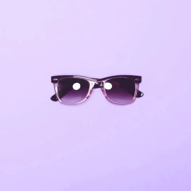 Photo of Lilac sunglasses - Trendy minimal design top view