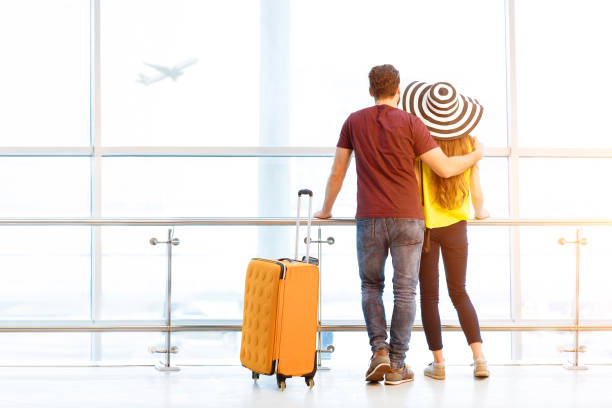 istock Couple at the airport 649796288
