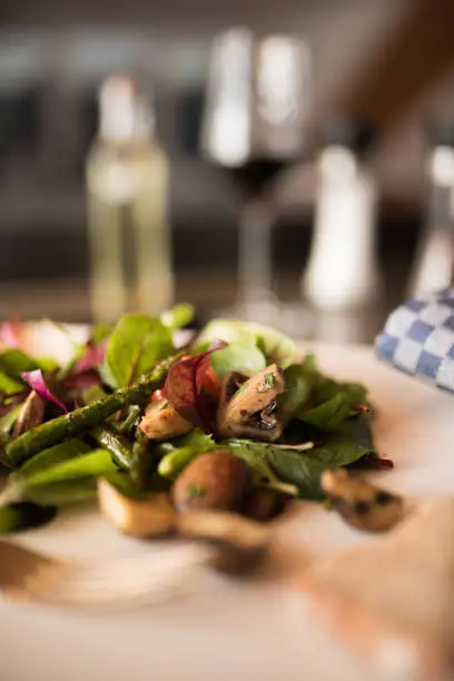 Fresh salad with asparagus and mushrooms and short depth of field