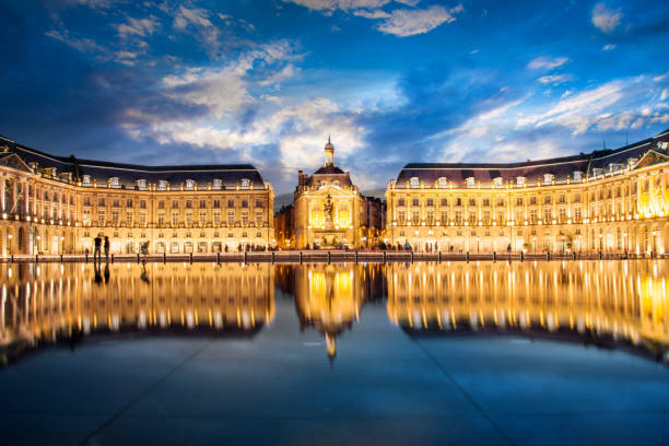 Place la Bourse in Bordeaux, the water mirror by night, France stock photo