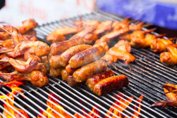 istock hot grill chicken wing BBQ grilled on fire Asian Thai style 649813696