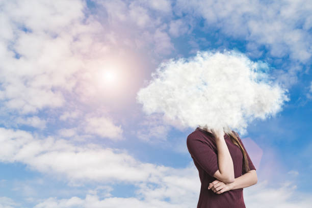 istock Girl in dress with cloud around head 649816932