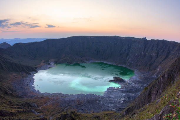 istock Green sulfuric lake in volcanic crater 649817120