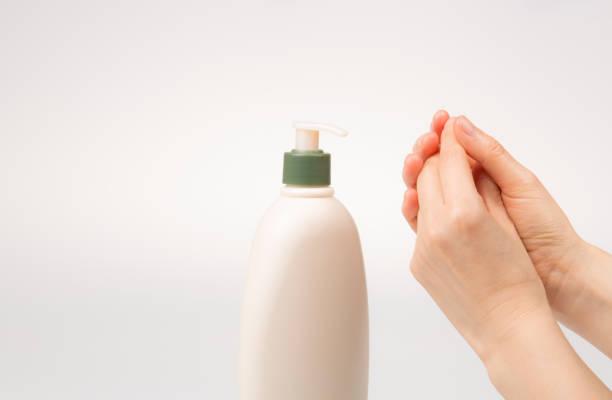 istock Woman hands with lotion 649825146