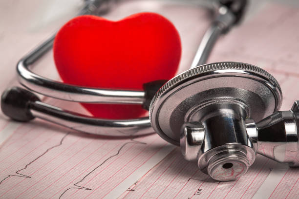 istock medical stethoscope with cardiogram and red heart 649829748