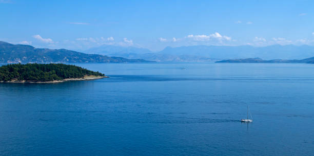 istock sailing along the island 649837114