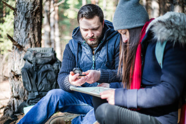 istock Couple backpackers hiking in the mountain 649845694