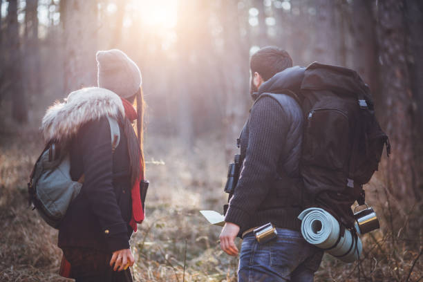 istock Couple of hikers in mountain forest 649848558